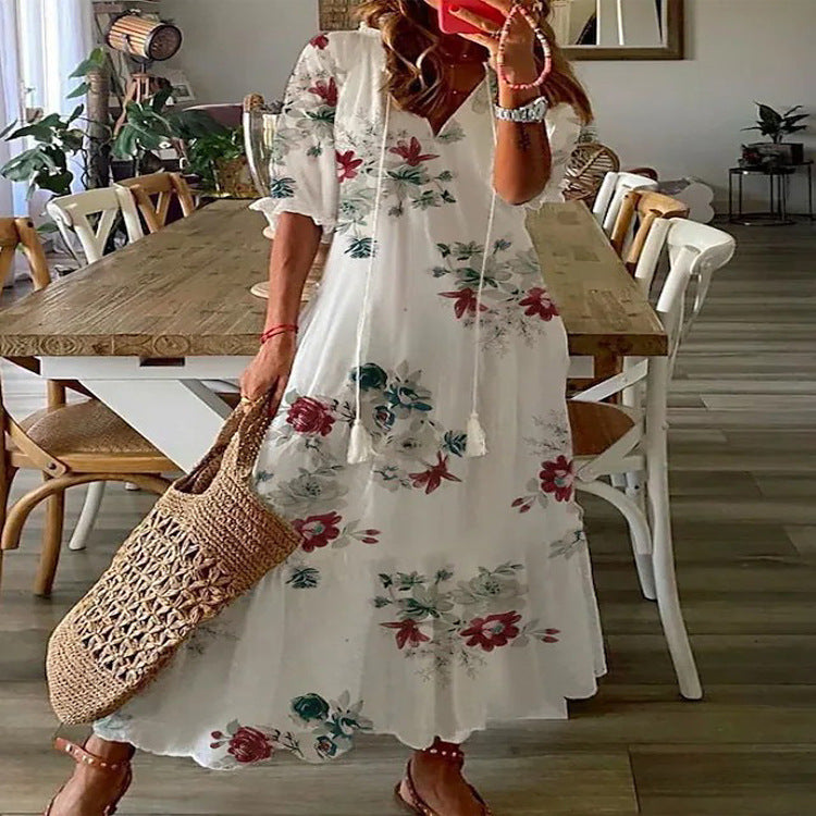 Andrea's™ | Lockeres Kleid mit V-Ausschnitt, Print, Quasten und halblangen Ärmeln