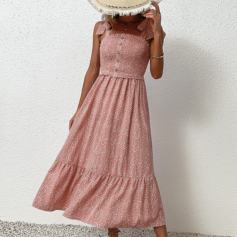 Geblümtes, rückenfreies Midikleid von Andrea Serena