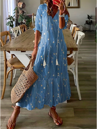 Andrea's™ | Lockeres Kleid mit V-Ausschnitt, Print, Quasten und halblangen Ärmeln