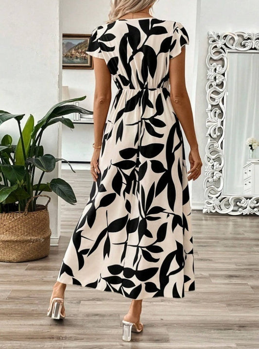 Elegantes Maxikleid mit V-Ausschnitt und Print von Andrea Serena