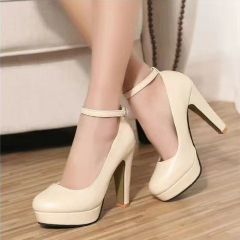 Elegant Chunky Heel Pumps by Andrea Serena