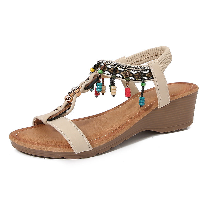 Elegante Strass-Keilsandalen von Andrea Serena