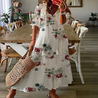 Andrea's™ | Lockeres Kleid mit V-Ausschnitt, Print, Quasten und halblangen Ärmeln
