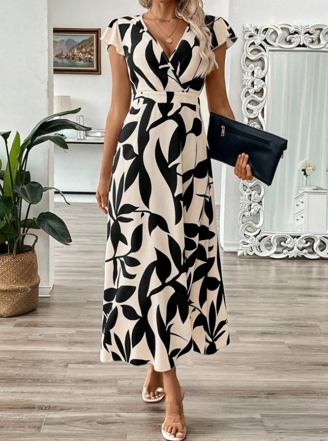 Elegantes Maxikleid mit V-Ausschnitt und Print von Andrea Serena