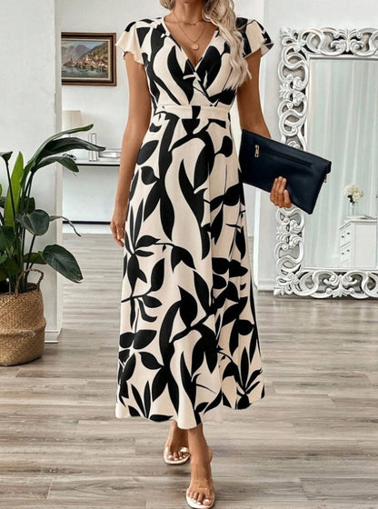Elegantes Maxikleid mit V-Ausschnitt und Print von Andrea Serena