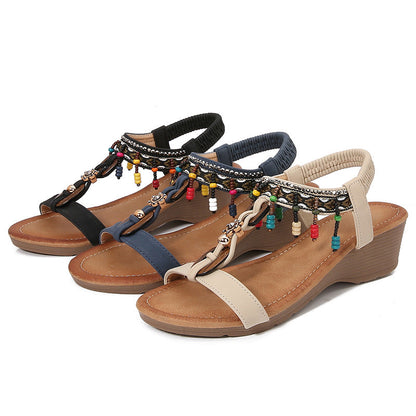 Elegante Strass-Keilsandalen von Andrea Serena