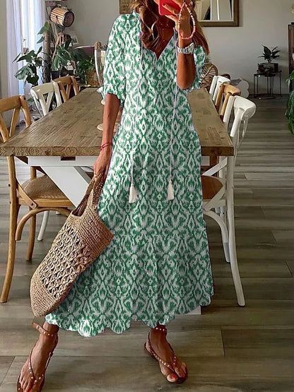 Andrea's™ | Lockeres Kleid mit V-Ausschnitt, Print, Quasten und halblangen Ärmeln