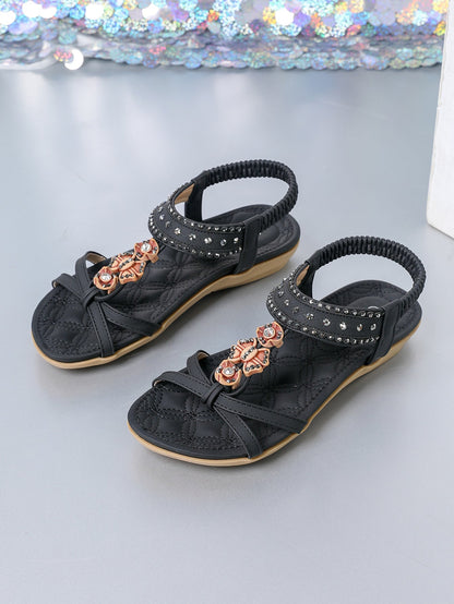 Elegante flache Sandalen mit Diamantmuster von Andrea Serena