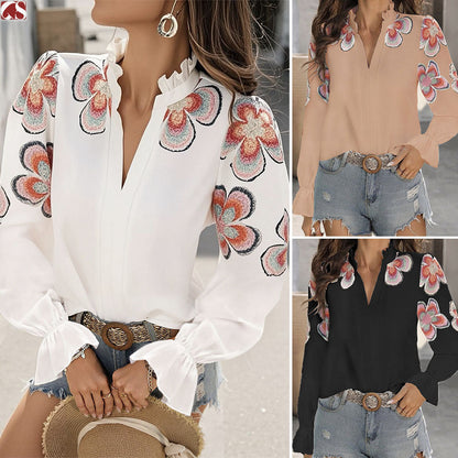 Chic V-Neck Ruffle Blouse by Andrea Serena
