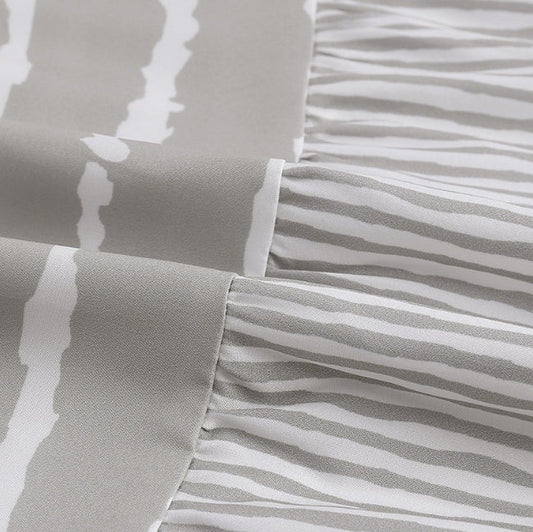 Gestreiftes Neckholder-Maxikleid von Andrea Serena