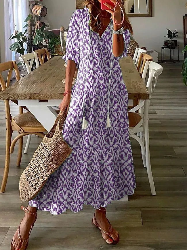 Andrea's™ | Lockeres Kleid mit V-Ausschnitt, Print, Quasten und halblangen Ärmeln