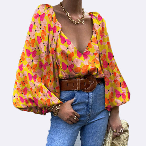 Retro-Bluse mit Schmetterlingsmotiv und V-Ausschnitt von Andrea Serena