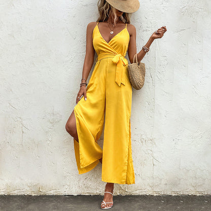 Leuchtend gelber Jumpsuit von Andrea Serena mit Bindebändern