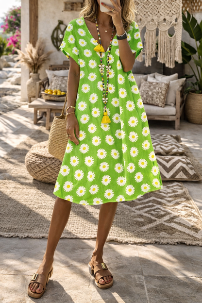 Strahlendes Sommerkleid von Andrea Serena mit Blumenmuster und V-Ausschnitt