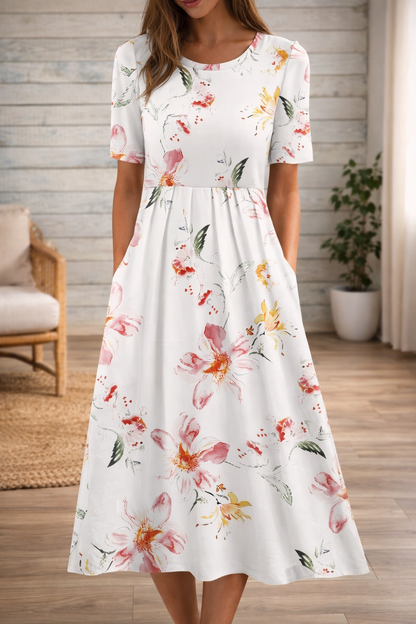 Kleid mit Blumenmuster und Rundhalsausschnitt von Andrea Serena