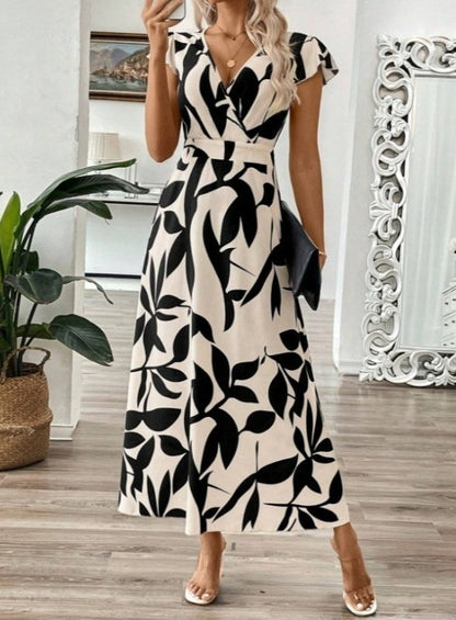 Elegantes Maxikleid mit V-Ausschnitt und Print von Andrea Serena