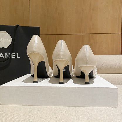 Elegante Stiletto-Pumps aus Spitze von Andrea Serena