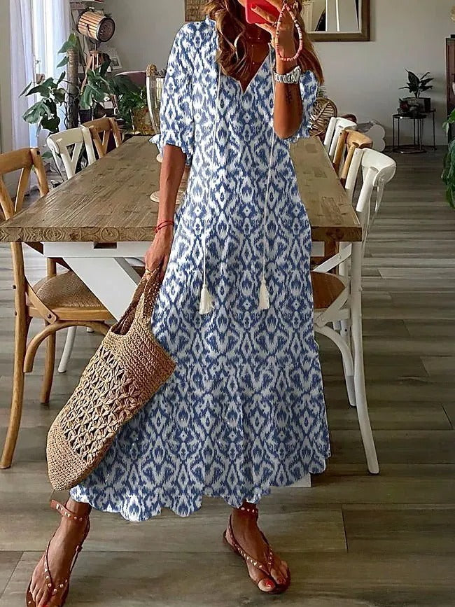 Andrea's™ | Lockeres Kleid mit V-Ausschnitt, Print, Quasten und halblangen Ärmeln
