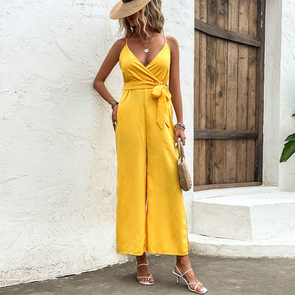 Leuchtend gelber Jumpsuit von Andrea Serena mit Bindebändern