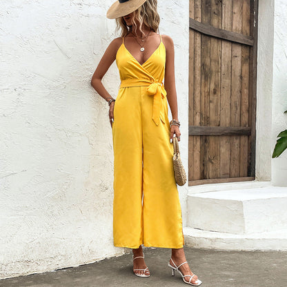 Leuchtend gelber Jumpsuit von Andrea Serena mit Bindebändern