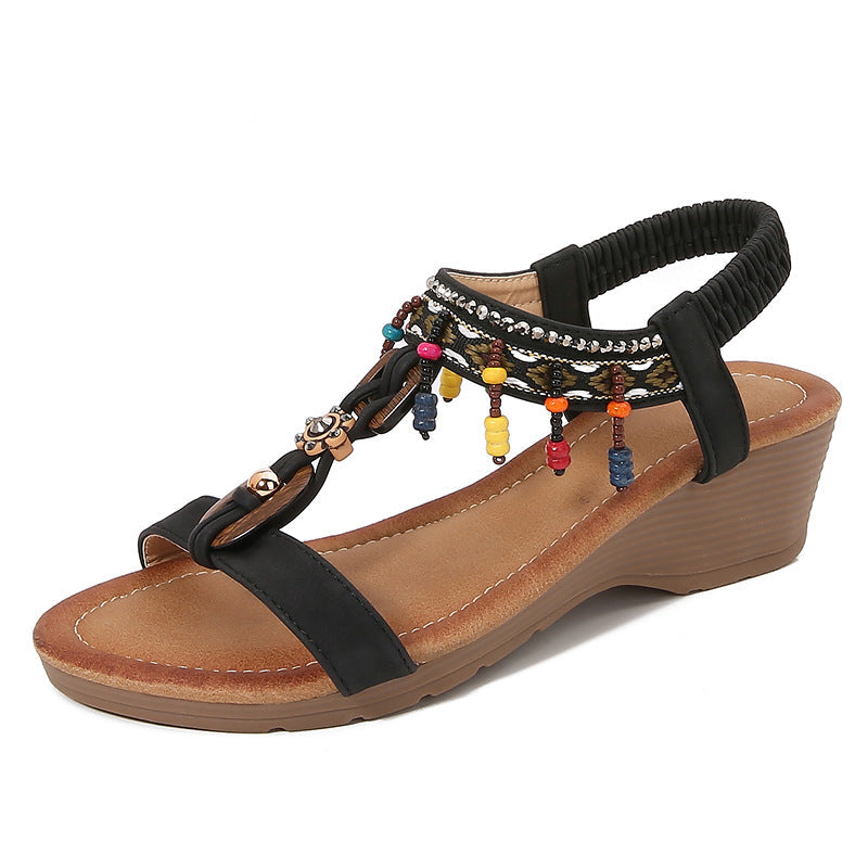 Elegante Strass-Keilsandalen von Andrea Serena