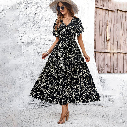 Elegantes, geometrisches Andrea Serena Kurzarm-Midikleid