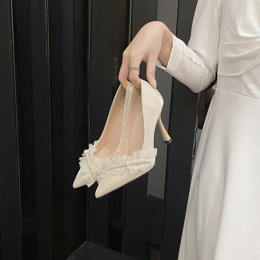 Elegante Stiletto-Pumps aus Spitze von Andrea Serena