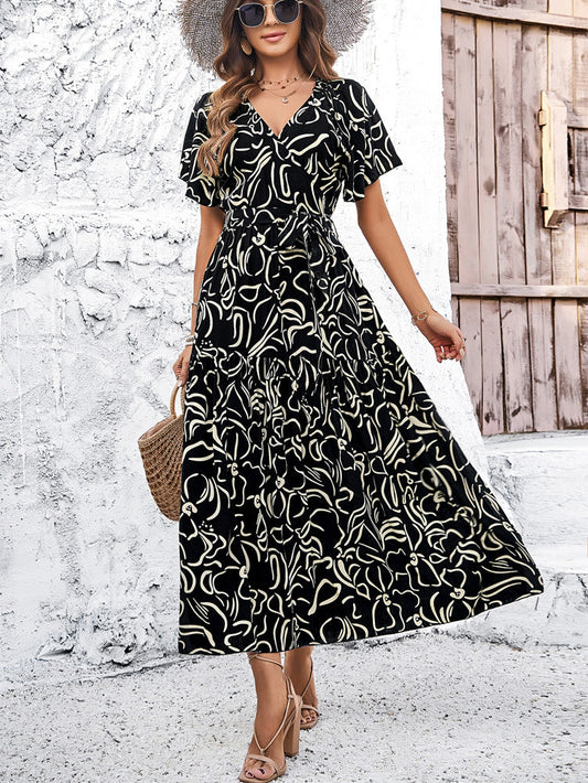 Elegantes, geometrisches Andrea Serena Kurzarm-Midikleid
