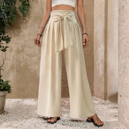 Damen-Freizeithose mit hohem Bund, Bindeband vorne, weitem Bein und hohem, fließendem Schnitt, einfarbig, in Unifarben.
