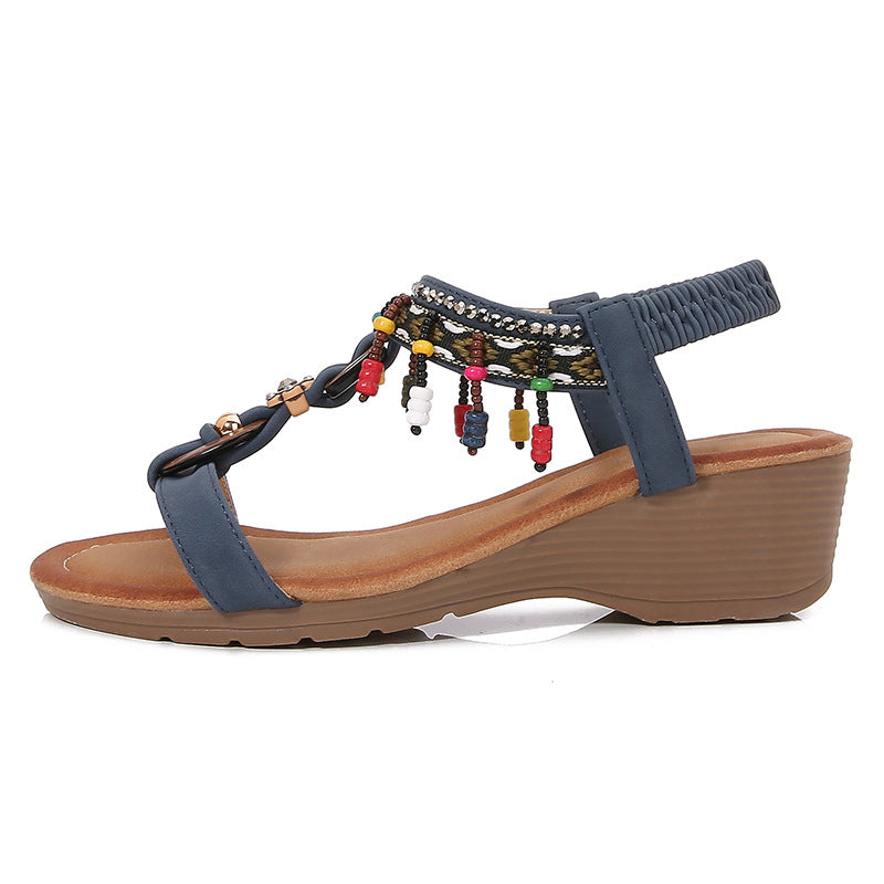 Elegante Strass-Keilsandalen von Andrea Serena