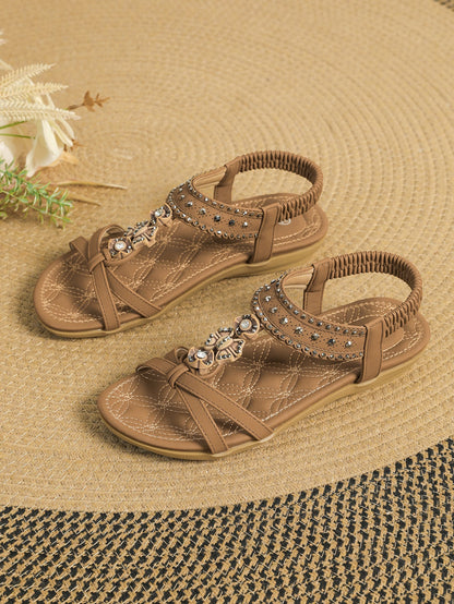 Elegante flache Sandalen mit Diamantmuster von Andrea Serena